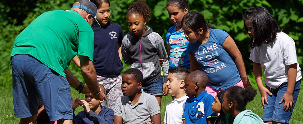 Kids watching demonstration 