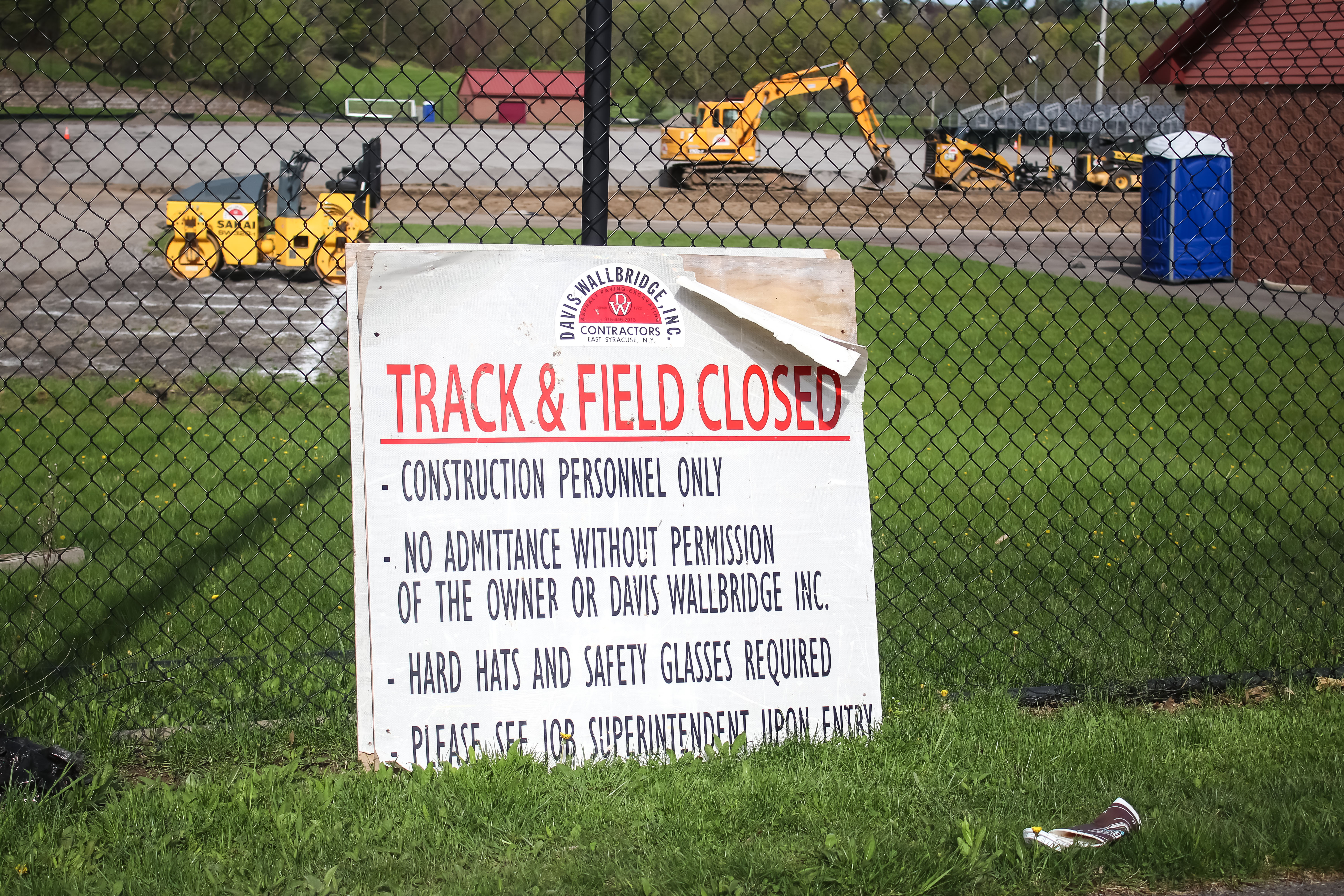 Sign on field that says closed